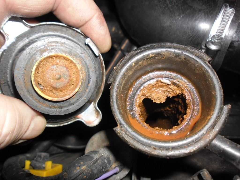 Черное масло в двигателе после замены, причины, можно ли ездить, чем отмыть