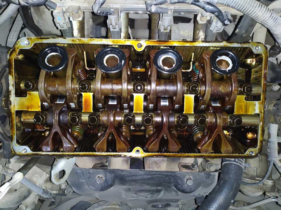 Замена прокладки клапанной крышки и свечных колодцев 4g63 в автомобиле mitsubishi lancer 9